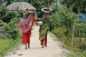Bangladesh women carry water